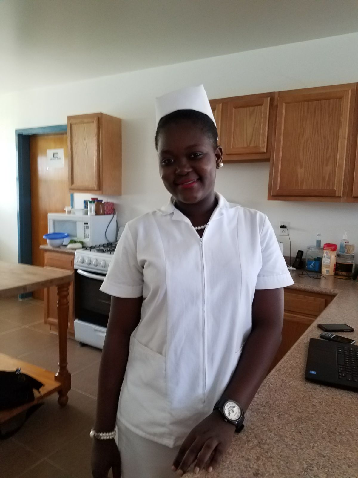 Rose Andre-Pierre (4th) celebrates nurses week (3rd year student and guest house helper).jpg