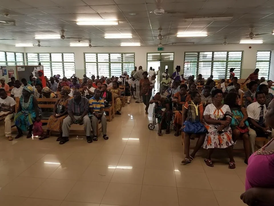 Waiting to be seen to see if we can help them. Every day the waiting area was filled to capacity.