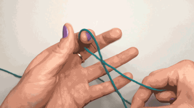 Slip a needle through the open knot from the right.