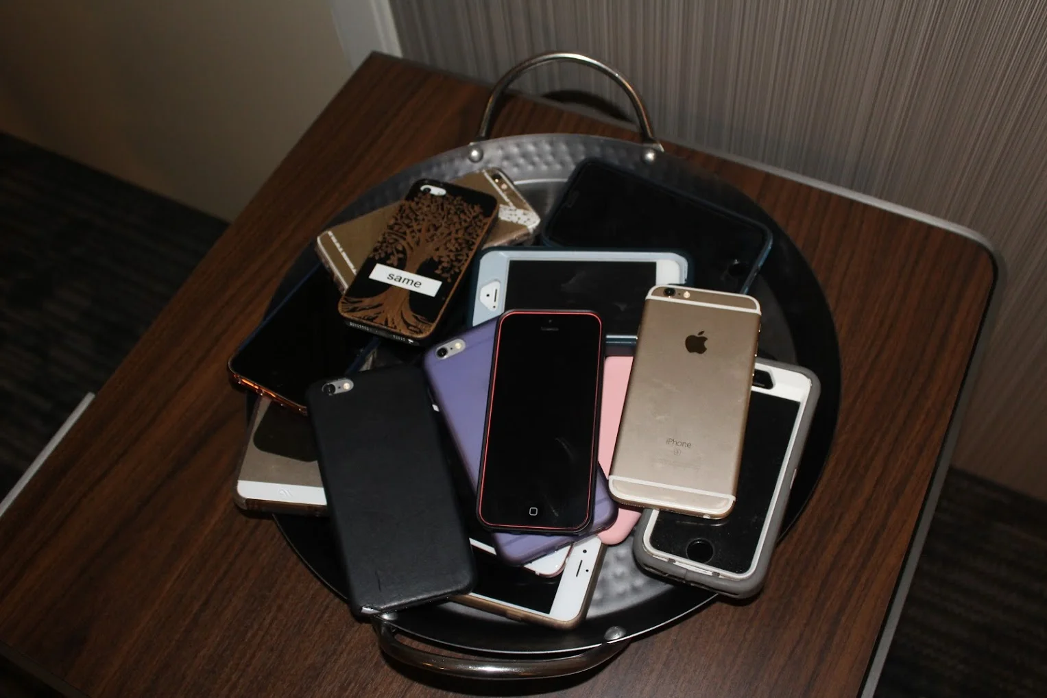 Phones in a pile off to the side so no one found out early...