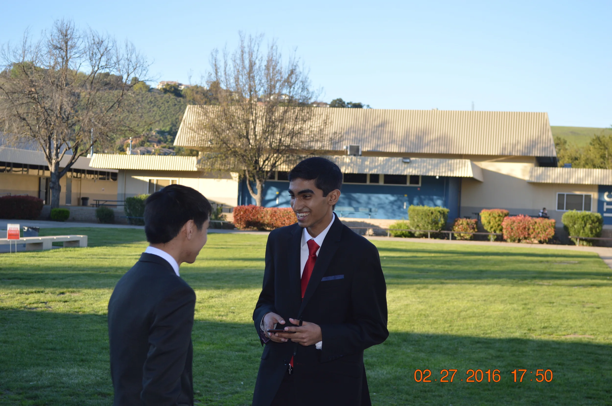 Partners Akaash Tawade and Jonathan Pham share a moment of laughter.