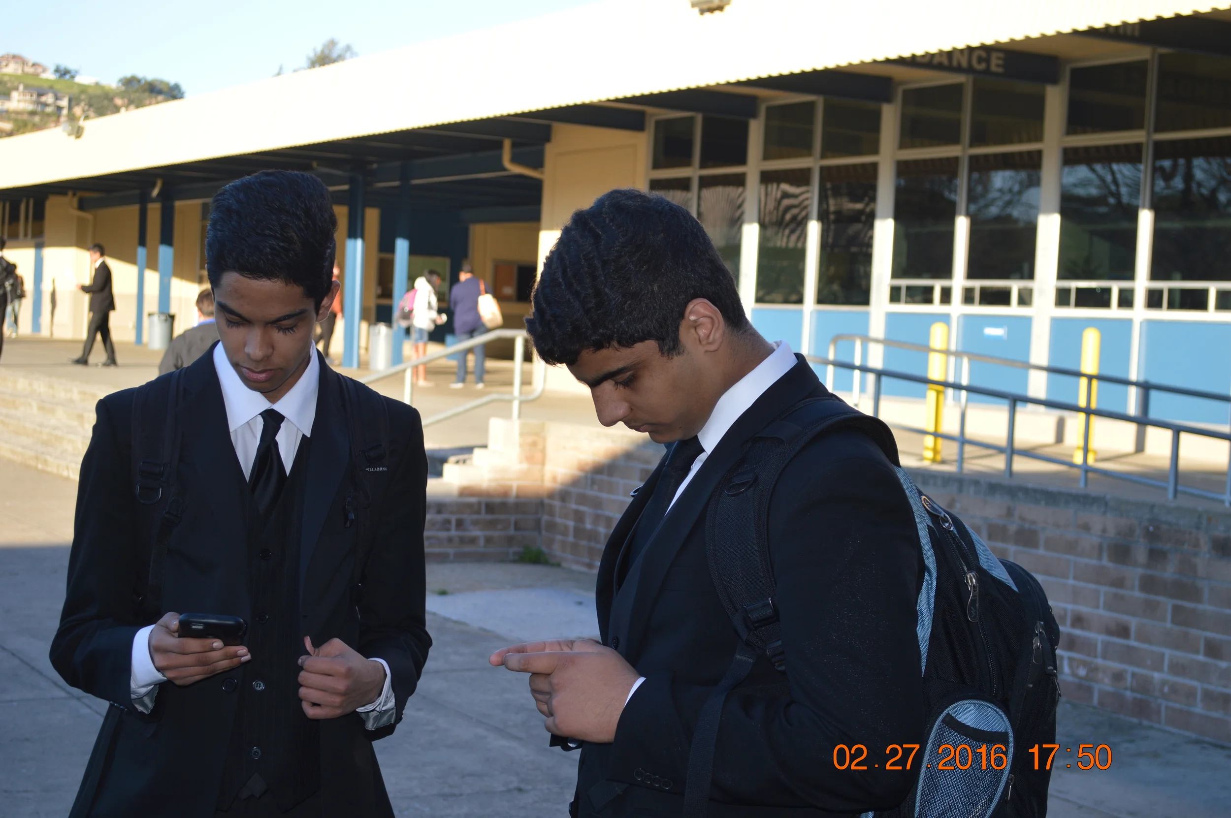 Partners Ismail Shaik and Pranav Govindaraju share a moment of anti-social phone using. Kids these days.....