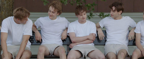 Guillaume (right) and his best friend (second right) in school.