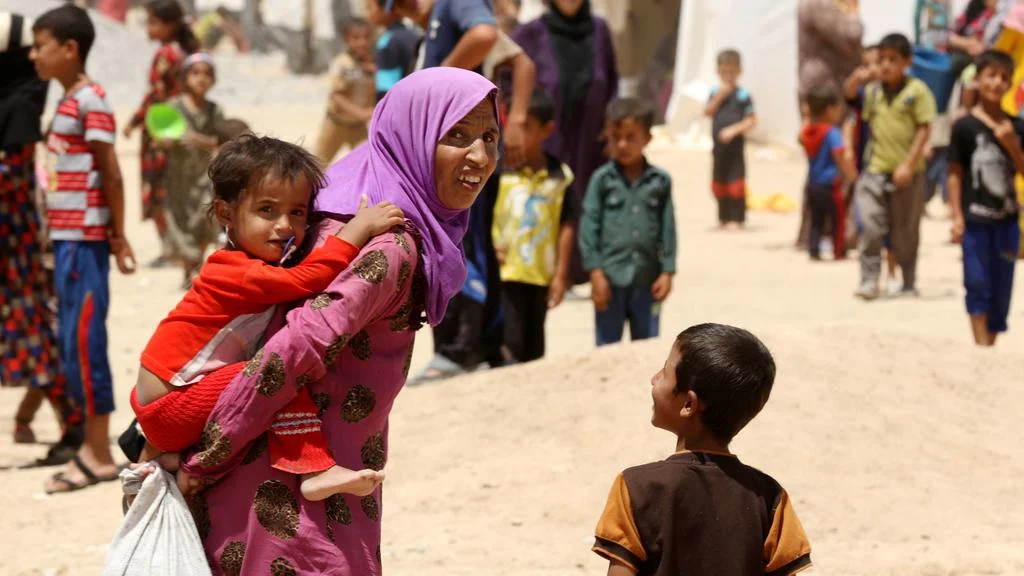 refugee family from web.jpg
