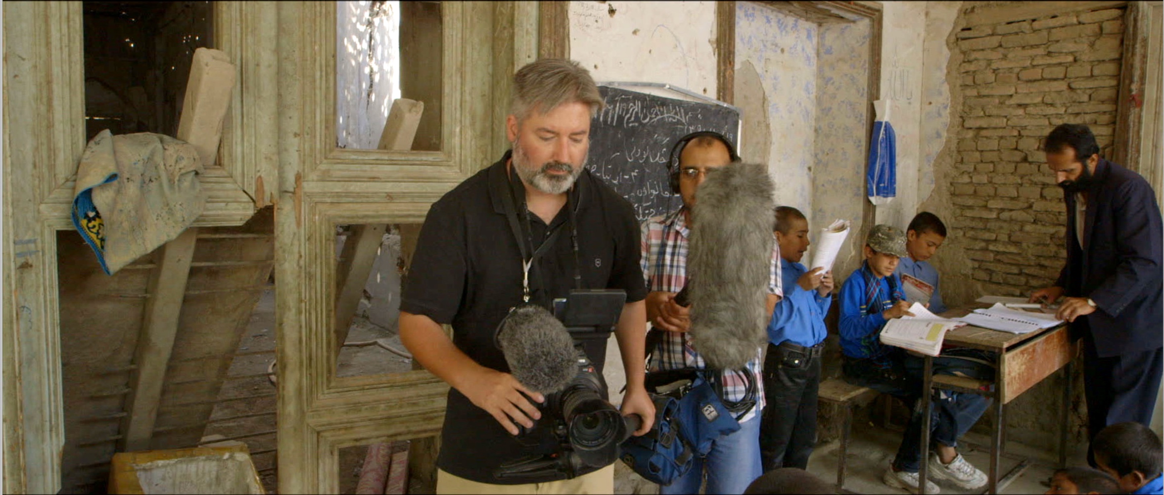 James Longley and Jamshid Amiry filming at the Daqiqi Balkhi school