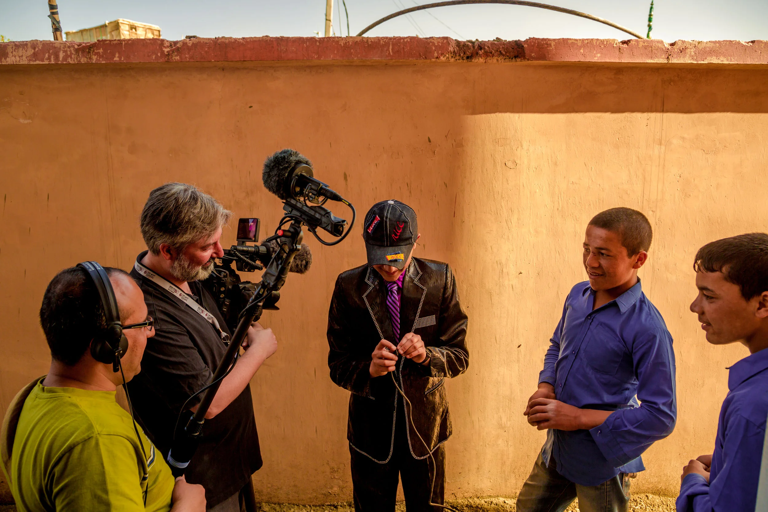 Talking with students in between filming at the Daqiqi Balkhi school
