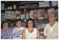 The Hamani family poses in their store in Obidos, on the Amazon River waterfront, where they have served passing navigators and "caboclo" jungle natives for decades. Mary (at far left) and Claudio (at far right) are first cousins. Marrying cousins was common among the Jewish communities of the Brazilian Amazon – where there were few other potential Jewish mates available. The Hamanis’ daughters, Ester and Carolina, do not wish to marry their cousins – so they must leave the jungle interior or assimilate, marrying non-Jews. Claudio believes this factor will eventually doom the Jewish community in the Amazon interior. “It is a great shame that the Amazon Jewish communities are disappearing,” Claudio says, “but our daughters don’t want to marry their cousins, and there is virtually no one else.”