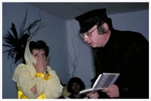 The Purim spiel in Vinnitsya is a bawdy affair. Mordechai, pictured above in Hasidic garb, shocks elegant Esther with his indecent proposal. Cross dressing Jewish community officials, with gold teeth and uneven breasts, solicit young King Ahasuerus — who nonetheless chooses Esther for his queen. A Nazi costumed Haman loses his eye patch when he is tossed to the ground, spanked and ejected from the scene. Everyone sings, eats hamantashen and drinks vodka. Though Vinnitsya’s Jewish community has not recovered religiously from the Soviet-era prohibitions on Jewish practice, Jewish culture is undergoing a veritable revival. Jews and Ukrainians alike are keenly interested in Yiddish theater and Klezmer music, in particular. Holidays like Purim provide a perfect opportunity for showcasing community members’ talents, silliness – and resilience. 
