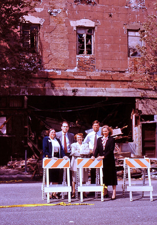 Greater Houston Preservation Alliance members stand in front of the Kennedy Corner Building, Travis at Congress, prior to its demolition in 1992. / PH file photo