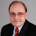 James F. Basile, Board Member Partner, Kirkland & Ellis LLP High school speech and debate changed my life. I came from a blue collar background. My father worked in the Pennsylvania Railroad freight yards and moonlighted as a bartender. But he wanted more for his children. When he saw that our school had a debate program, he insisted (with limited enthusiasm from me) that I try out. The moment I began to participate, it was like a light switch went on. A world of ideas opened for me. I began to imagine doing things and going places of which I previously hadn't dreamed. I learned essential skills: critical thinking, logic, research, the ability to see both sides of complex issues and how to speak in public. Perhaps more important, speech and debate taught lessons of character: hard work and personal responsibility, delivering on deadlines, working as a team, and learning to compete in pressure situations. Through all of this, my confidence soared. Moreover, I was surrounded by kids experiencing the same transformation. By swimming in a sea of other awakening young minds, I benefited from their experiences and gifts rubbing off on me through competition, collaborative work and just bull sessions. In this way, social interaction among speech and debate participants leads to geometric growth in skills and understanding. It also creates deep, lifelong friendships. I went on to college, law school, worked on law review and became a partner at a large national law firm. None of these experiences were as important an educational experience as the cornerstone of high school speech and debate When I see shy, uncertain students blossom into confidence, competence and self-motivation, I think back to how doubting and scared I was when I started, and I marvel at the transformational power of the activity. It is for these reasons that I feel so strongly about SVUDL and what it can do. Speech and debate - by providing actual portable skills transferable to professions, business and academia - provides a singular opportunity for students to learn to operate effectively within a wide variety of settings and institutions. Having those skills will enable students to fulfill their potential, achieve their aspirations and to work to shape society in accordance with their values. In short, SVUDL is the best educational chance for kids who are woefully underserved in our society. For just a little output in time and resources, we can change students’ lives for the better and those lives in turn will create ripples of hope and good for their families, for others throughout their community and our country. I hope everyone who reads this will think about that and support SVUDL in its noble task.