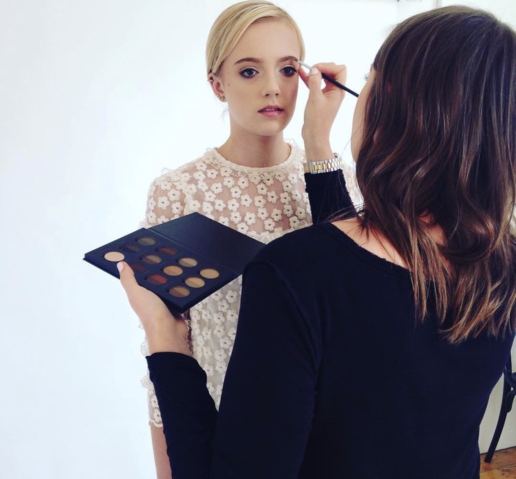 Lucy Blake Applying Makeup