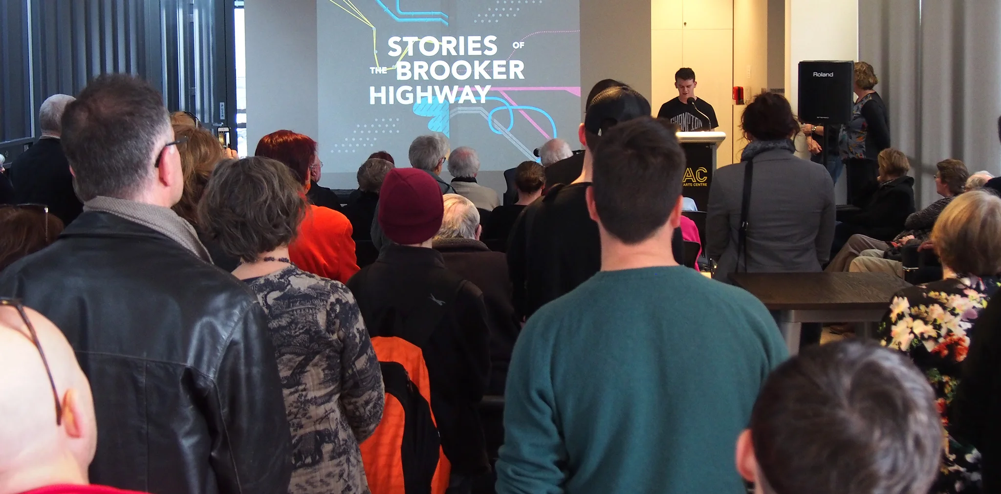 Claremont College student James Finearty reads his piece, 'The Elwick Drive-In', at the Stories of the Brooker Highway exhibition launch.