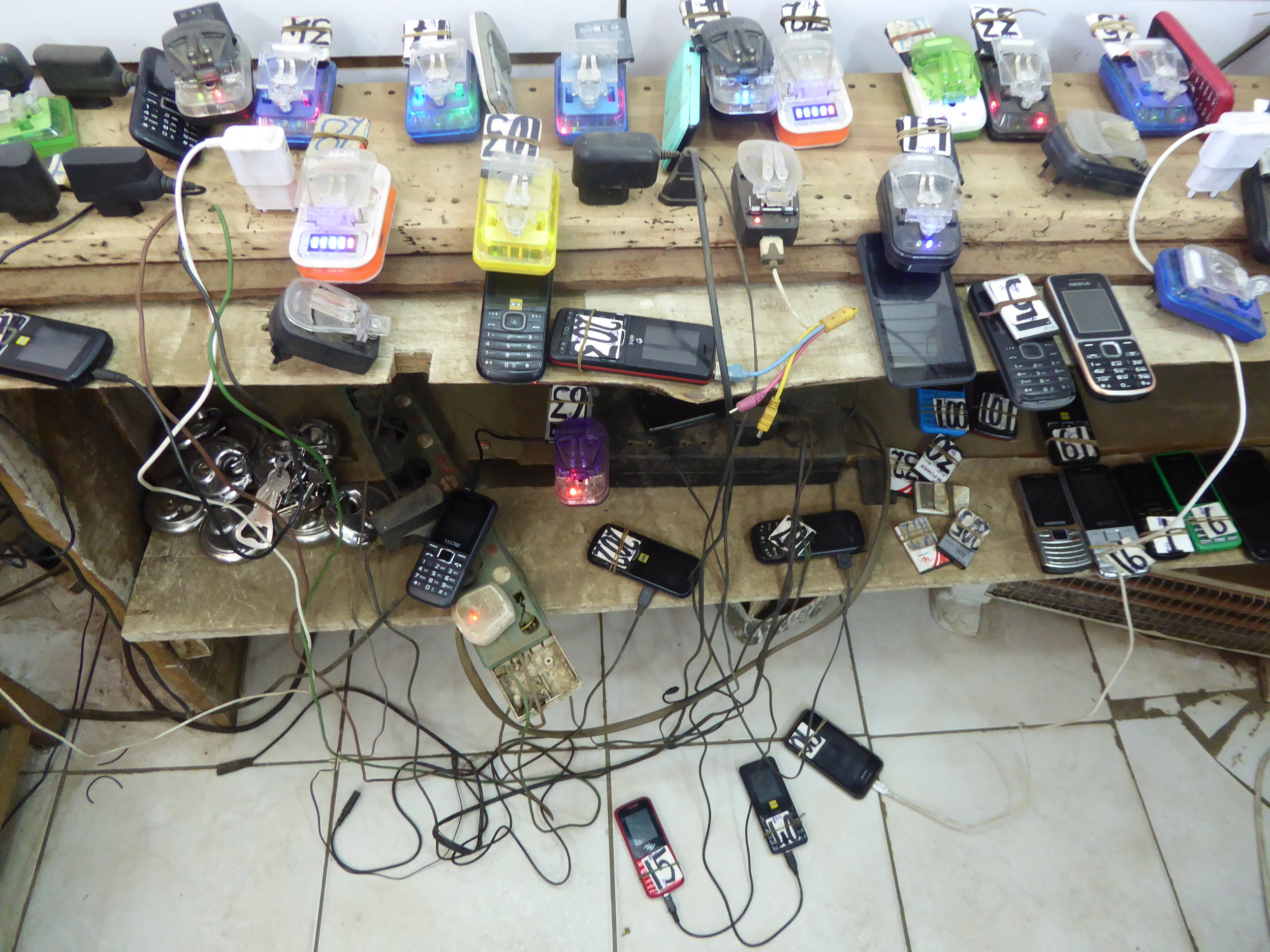Mobile battery charging station in a stall in New Soweto Market, Lusaka Photo: Wendy Willems