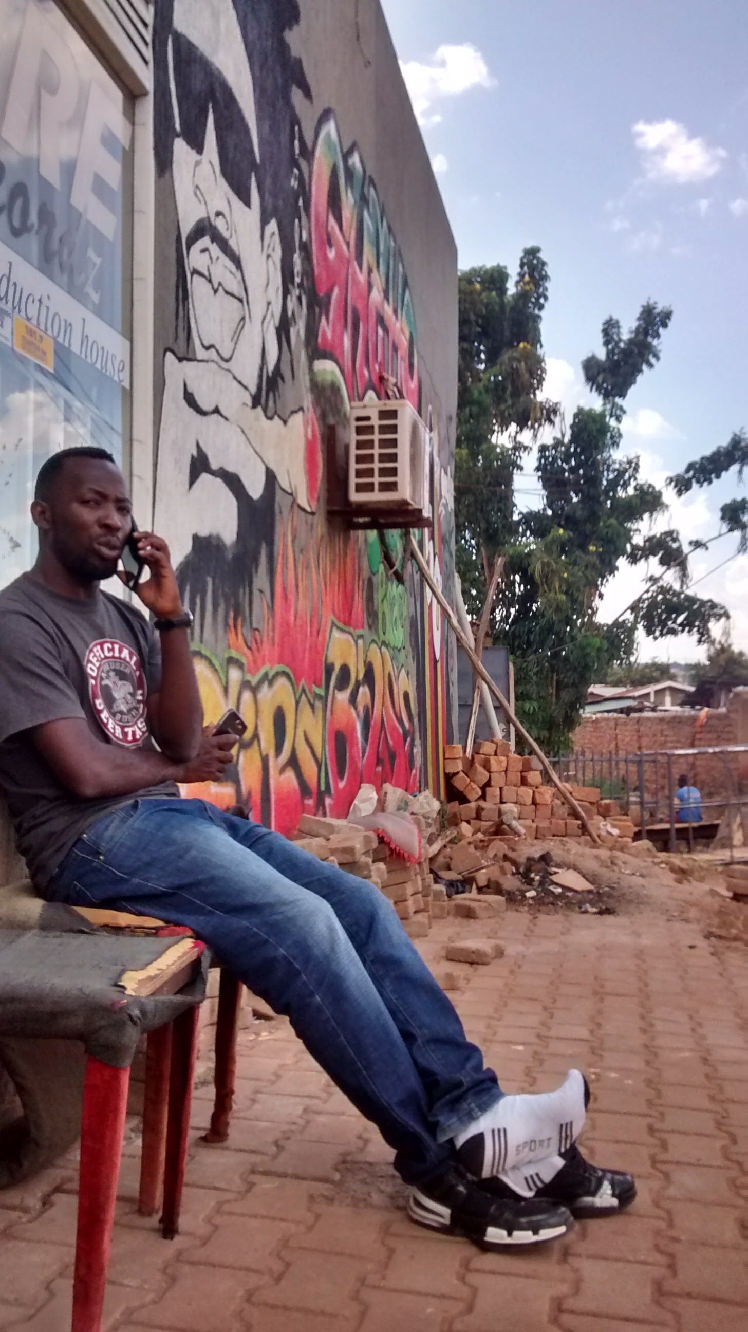 Johnson and the phones in front of Firebase Studios