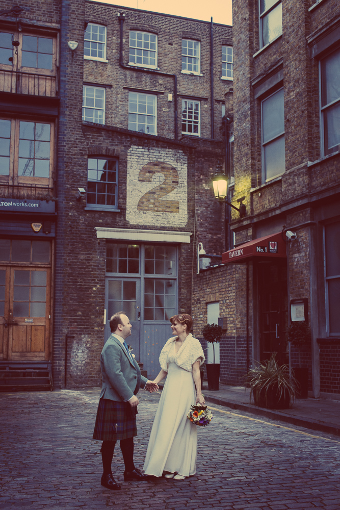 Bride and groom portrait in Bleeding Heart Yard
