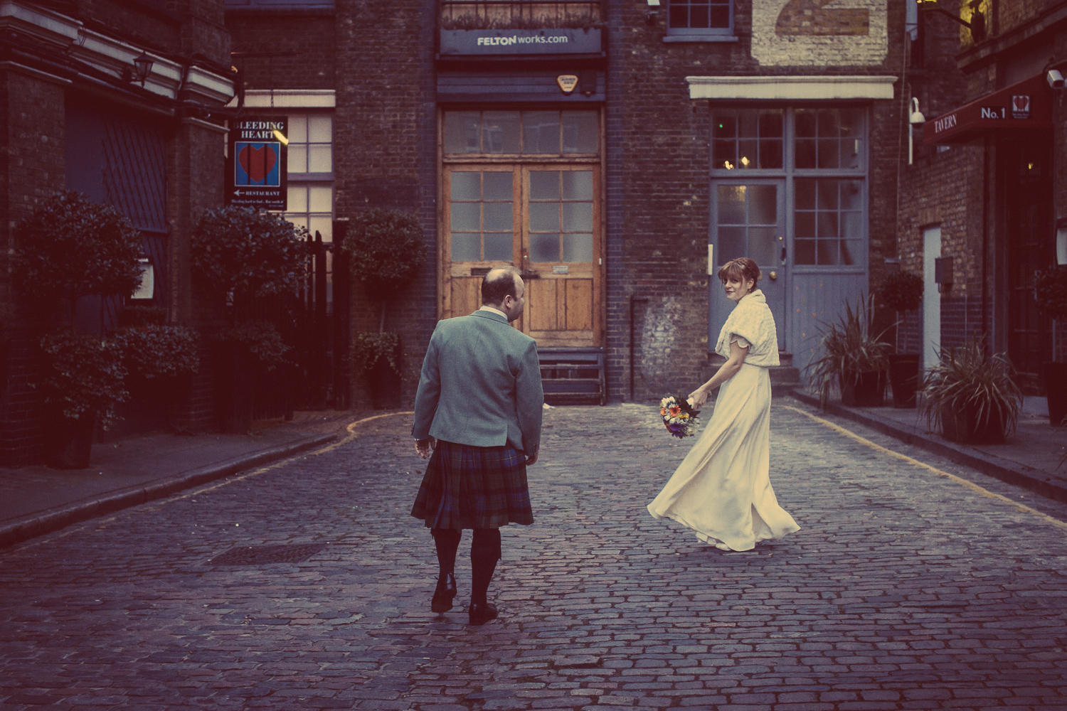Bride and groom portrait in Bleeding Heart Yard