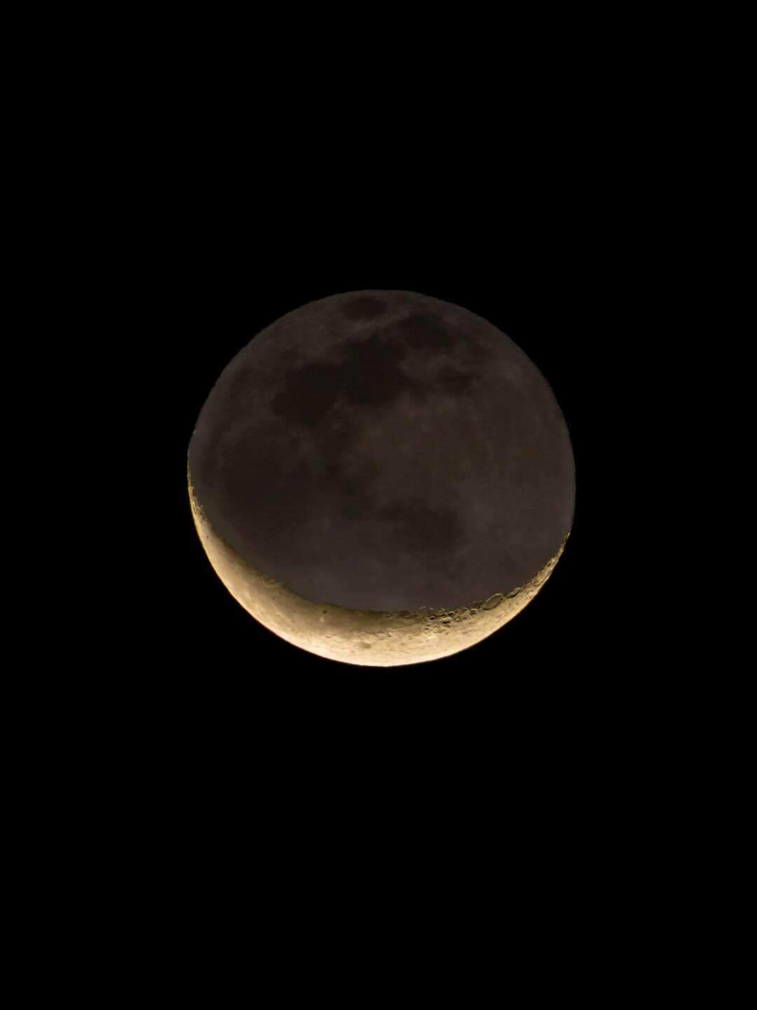 \ Waning Crescent with Earthshine \