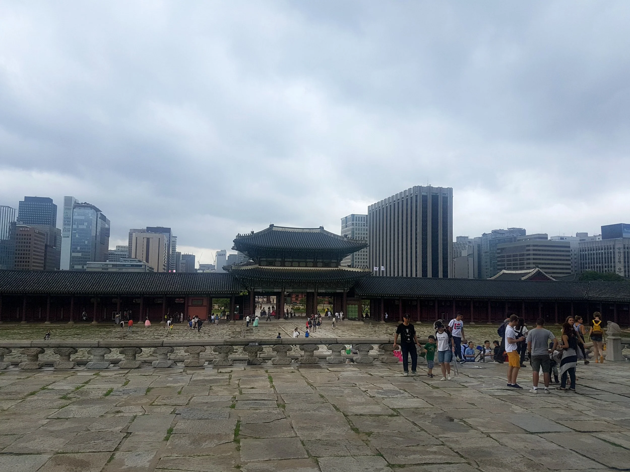 The old and the new, right next to each other. The temple area is located in between the mountains and the city.