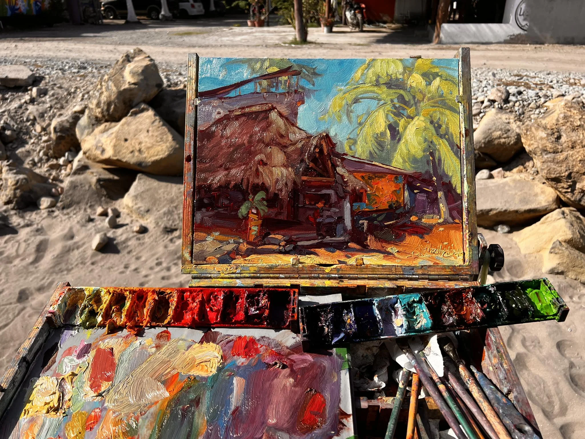 Dominik Modlinski painting plein air on the beach in San Blas, Mexico