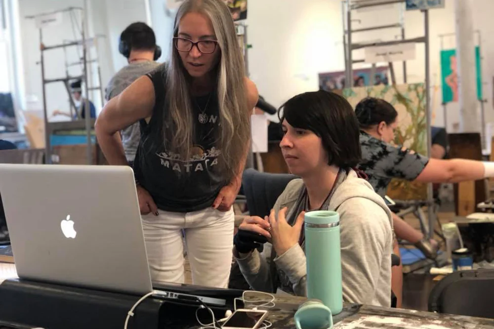 Getting feedback from Julie Bell. (Photo curtesy of Irene Gallo)