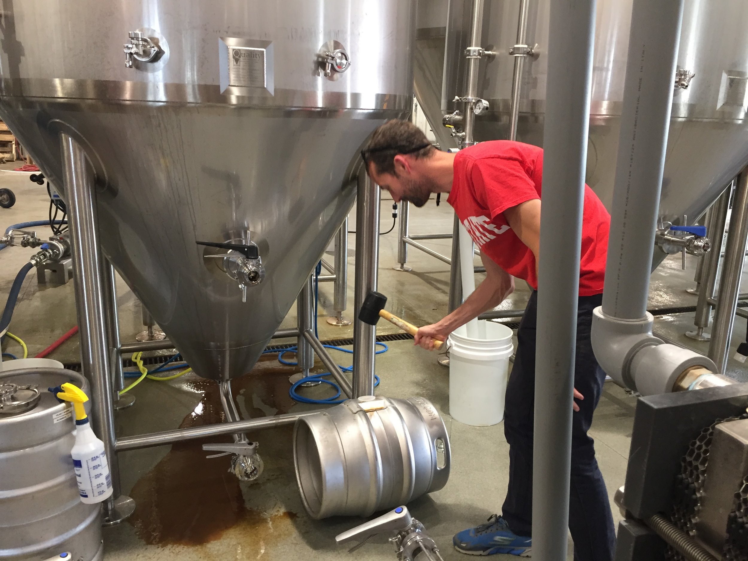 The ingredients are in! Craig seals the cask.