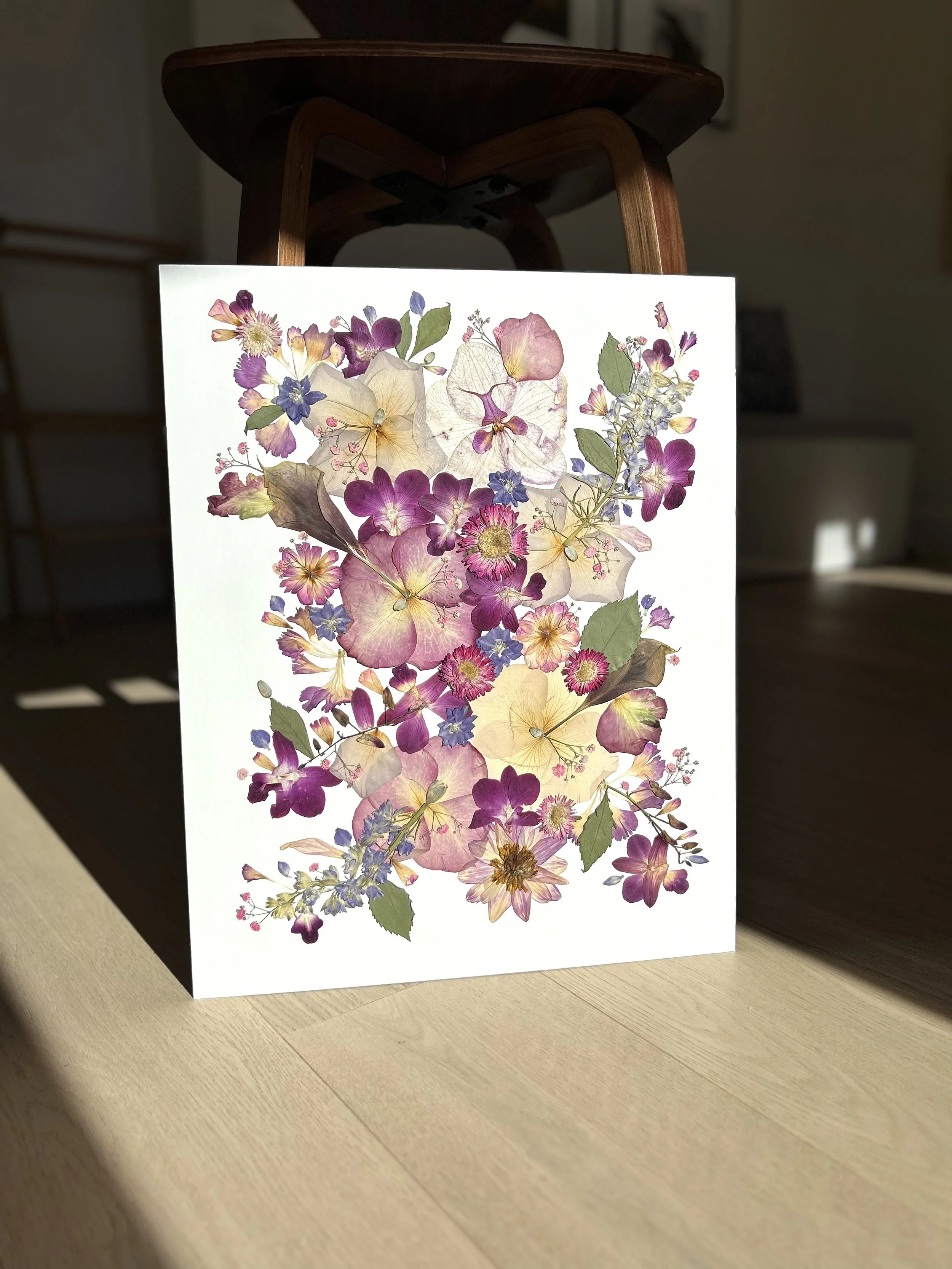 A wedding bouquet full of colour and pressed orchids