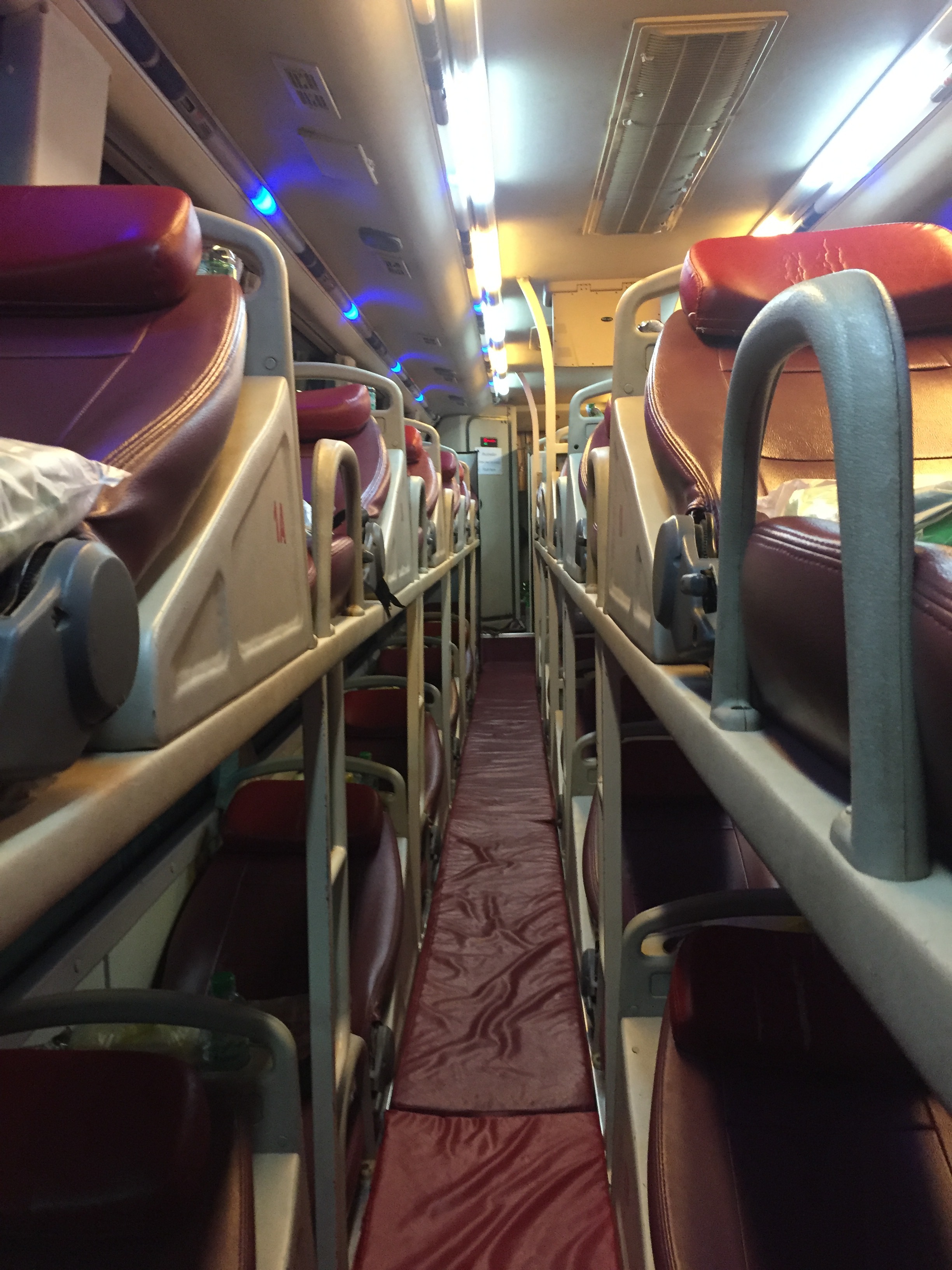 3 rows of seats on the VIP sleeper bus and surprisingly quite comfortable! Blanket, water, and dinner provided.