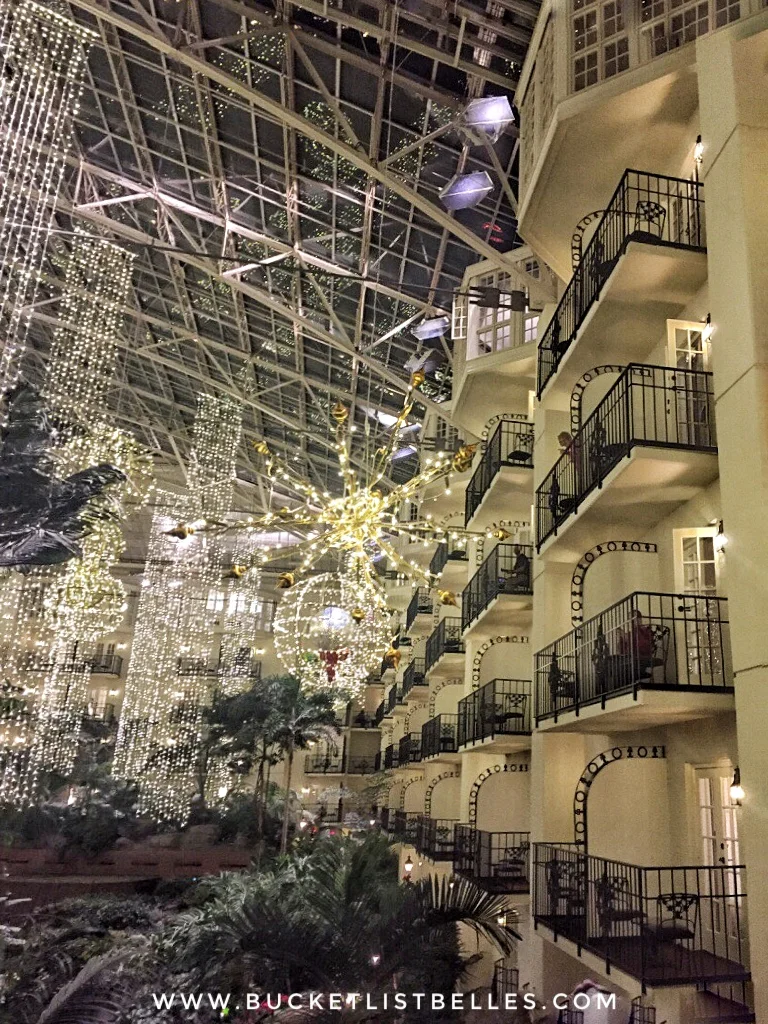 Hotel guest rooms view out into the lush vegetation and public spaces. 