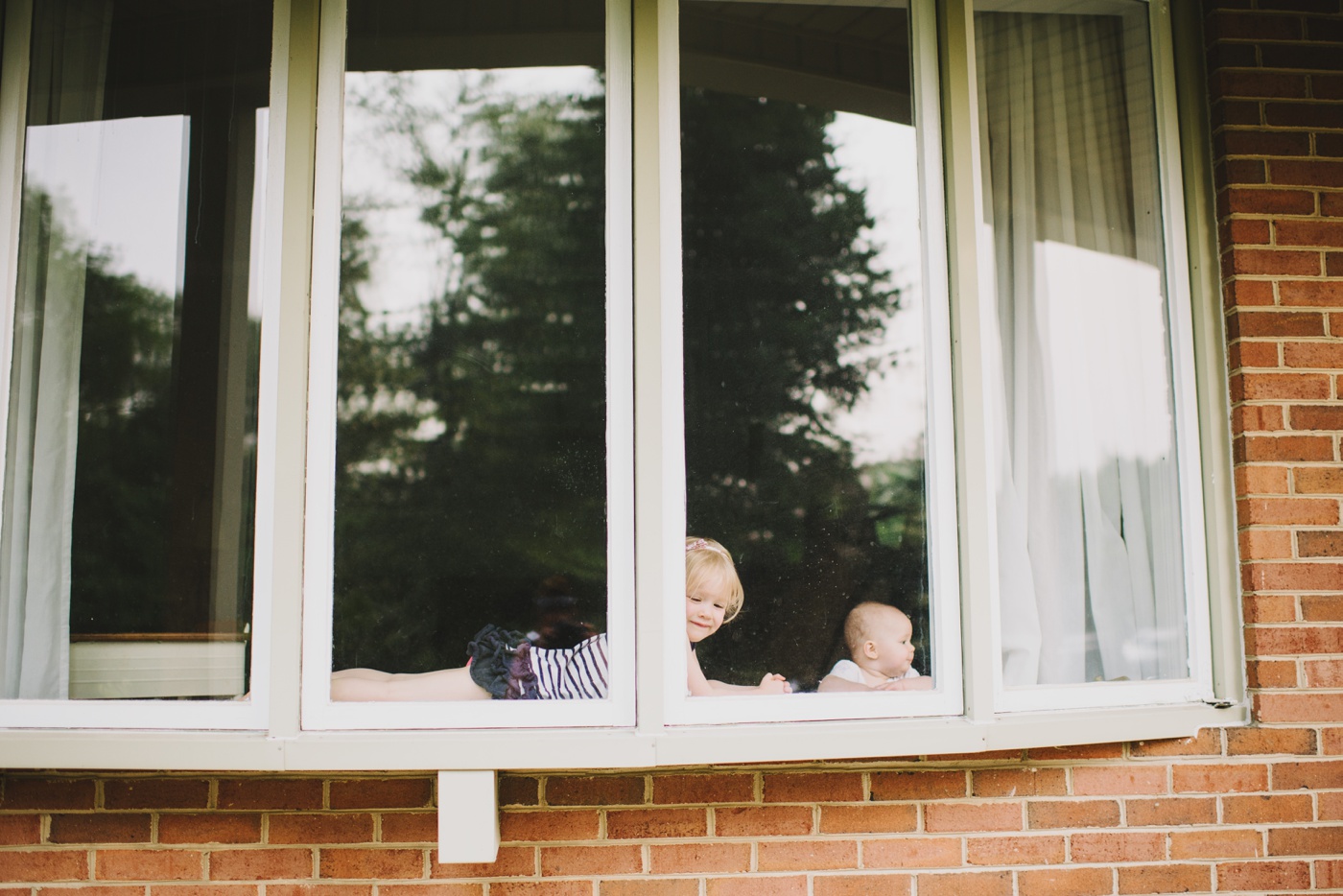 Little girl in window