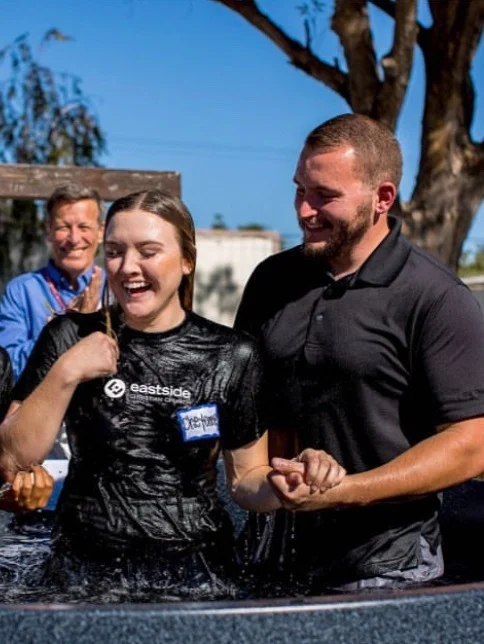 Pastor Matt baptizing people after church.