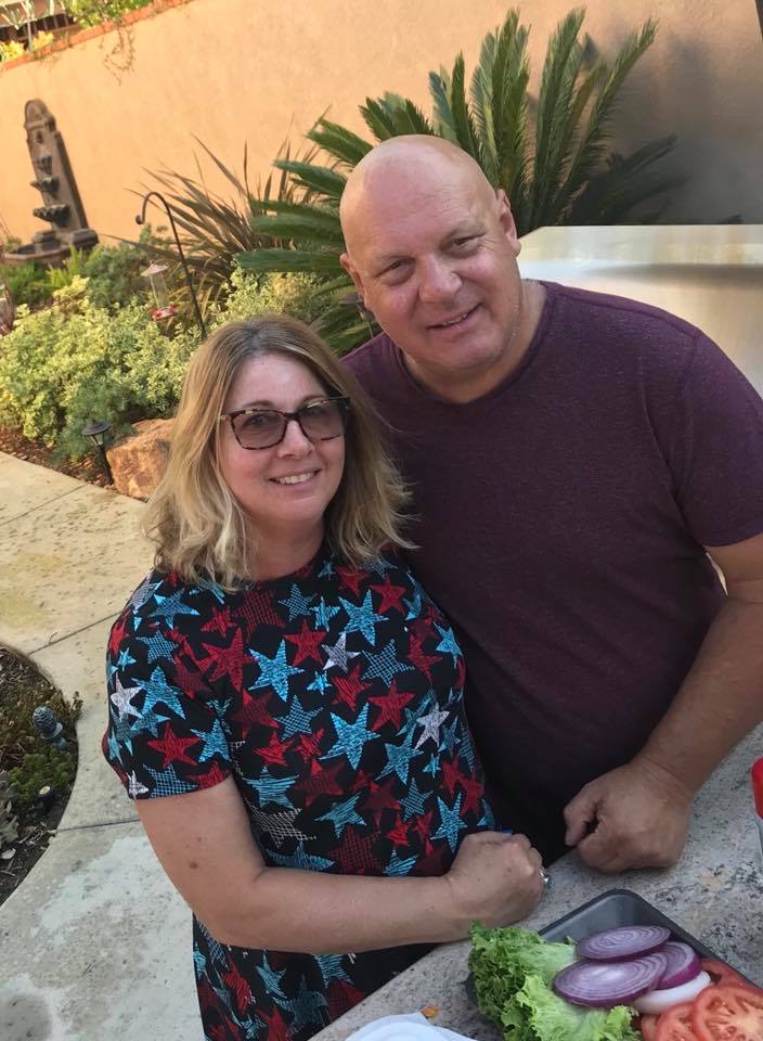 Cindy and Gerry in their backyard where we have enjoyed many a meal over the years.