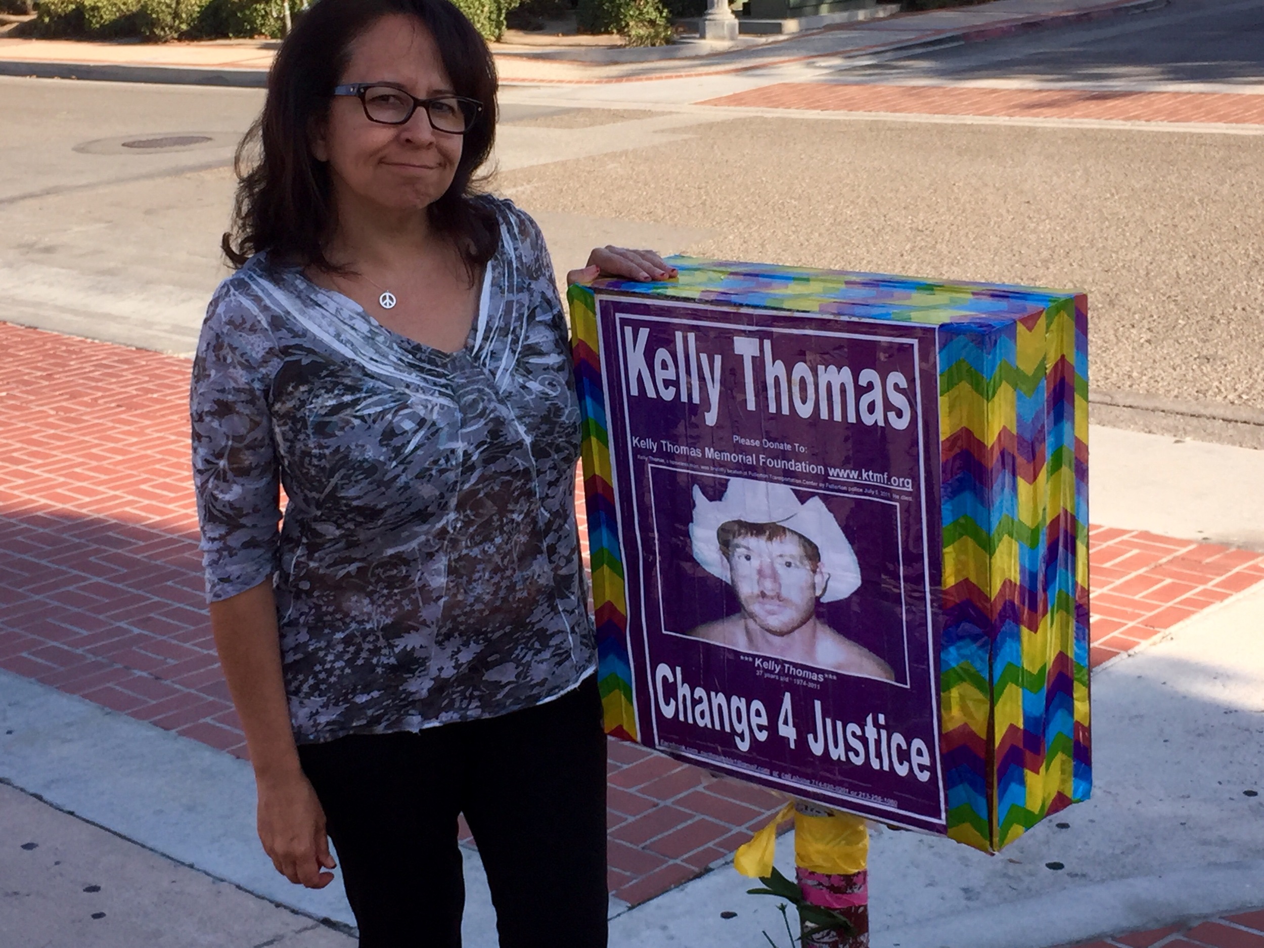 Dolores Sanchez at Kelly Corner, Fullerton, CA. The corner is the site of the death of Kelly at the hands of Fullerton Police.
