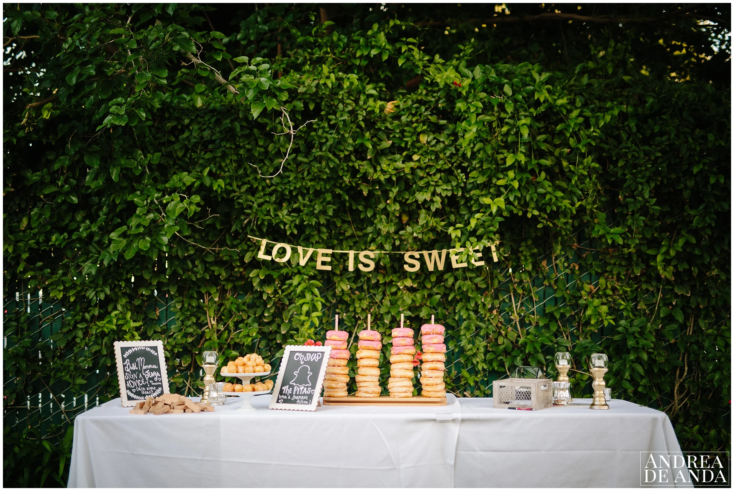 Ceremony details, candy bar, Bride and Groom creative pictures Secret Garden wedding ceremony Madonna Inn wedding. San Luis Obispo Wedding Photographer