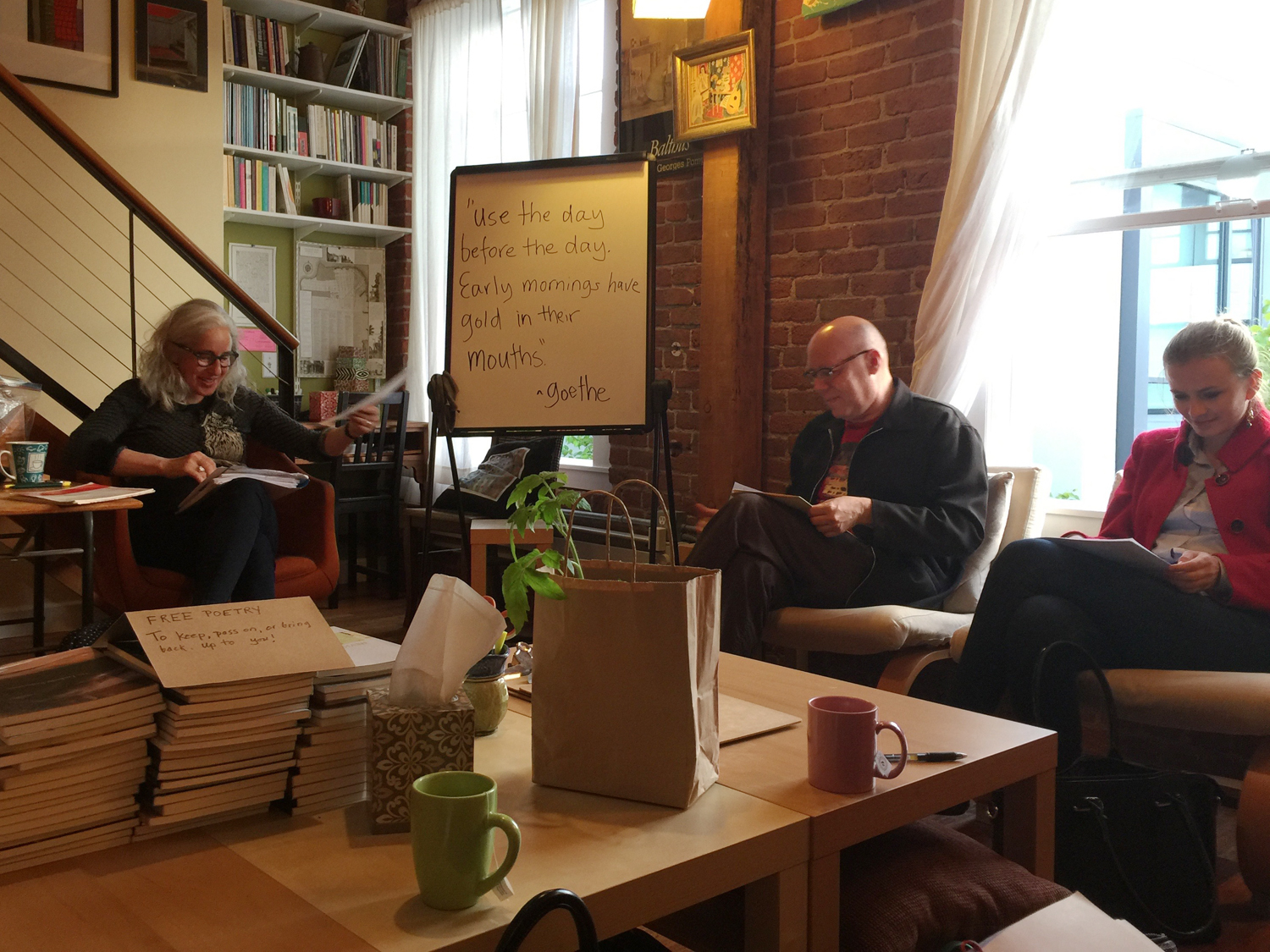 Thursday night poetry class. Julie Bruck , our fearless leader, checks the Warriors score for us between each poem. Isn't this the coziest-looking place to meet? We'll miss it, as the Writing Salon must look for new digs.