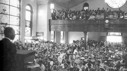 Mass meeting at Holt Street Baptist Church calls for a bus boycott, December, 1955.