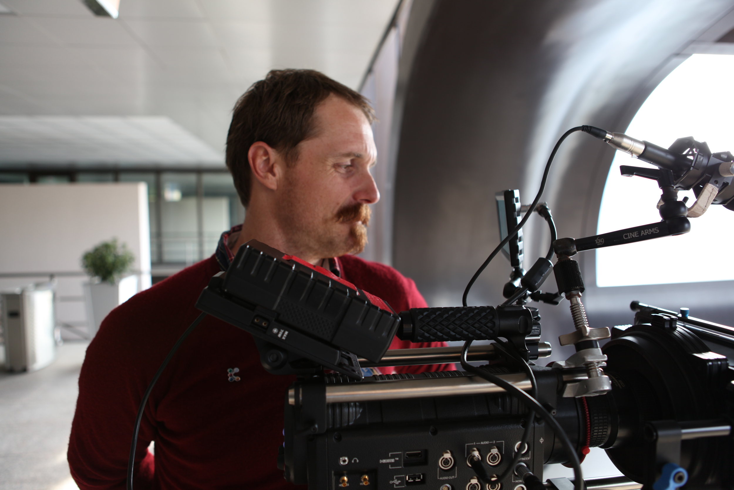 Director / DP Vern Moen shooting broll at the K-show in Dusseldorf, Germany.