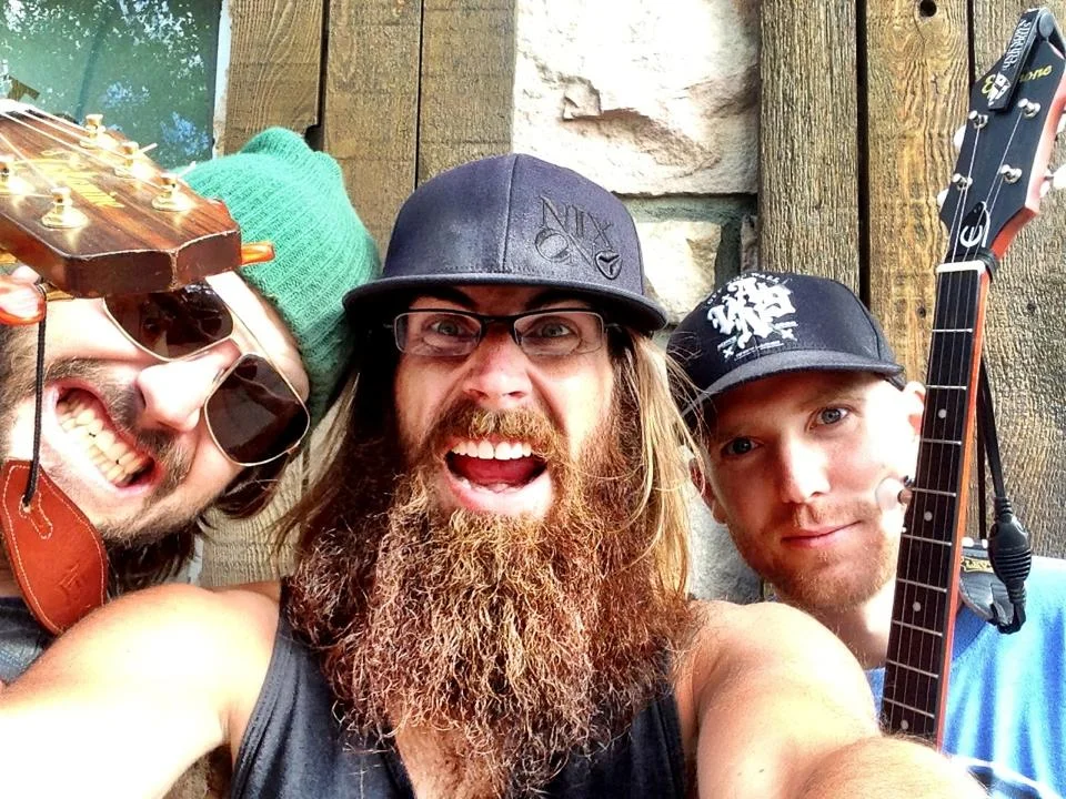 Devon Coyote Trio Busking.jpg