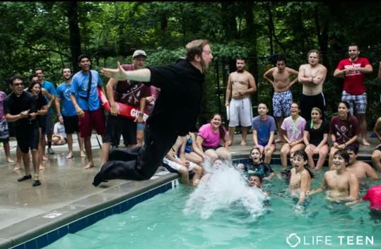 This is the very essence of Brother Peter Francis- no thought of himself, just the hilarious joy every teenager at camp would get out of his full-habit belly flop!