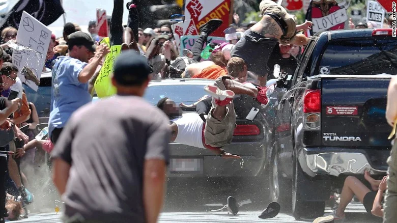 Look at this and let us all weep for our country. See the shoes under the car? God's justice will not sleep long. Photo Source: http://www.cnn.com/2017/08/13/us/charlottesville-white-nationalist-rally-car-crash/index.html