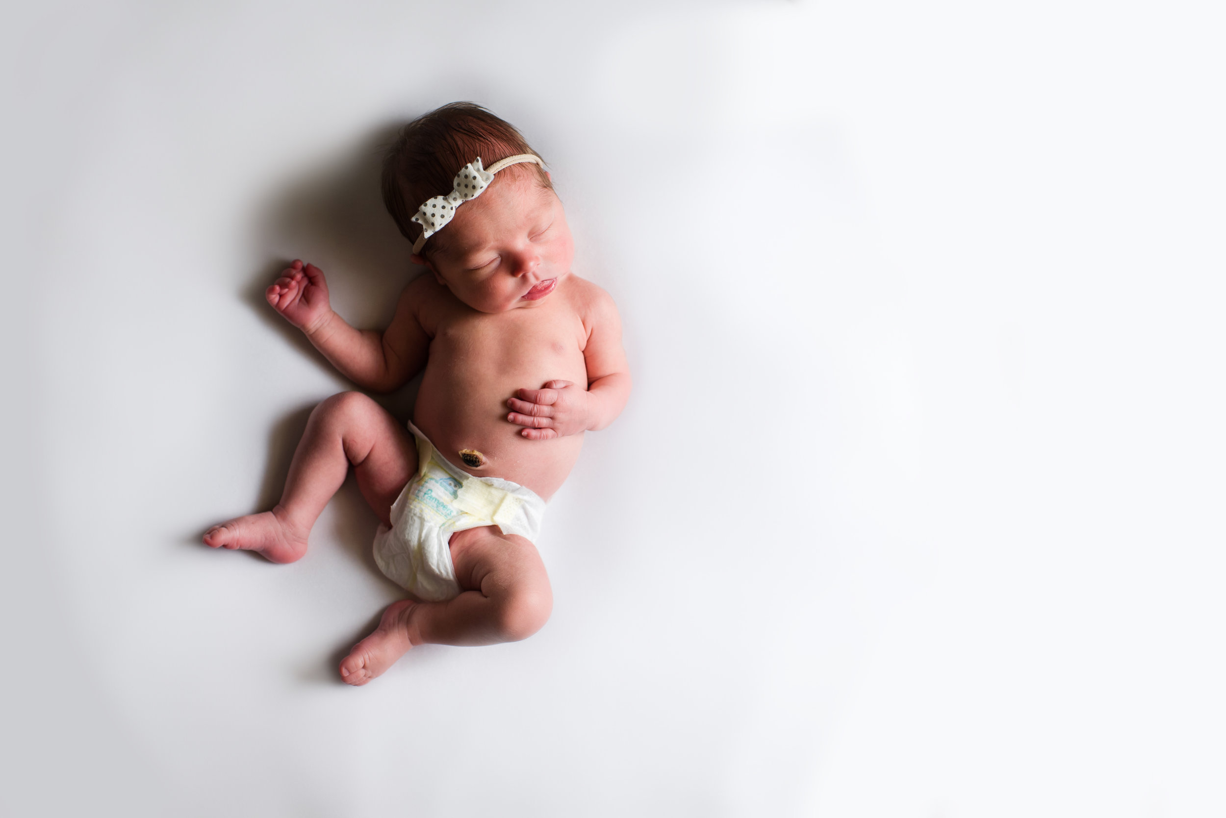 lola-newborn-session-at-home-madison-al-photographers-25.jpg