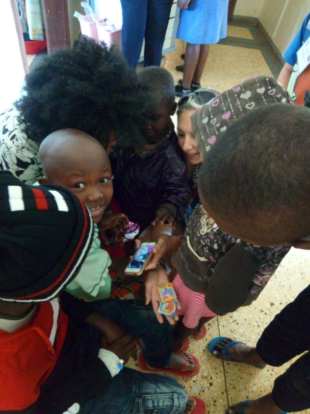 Morgan introducing SpellBound to the patients in Kenya. Photo provided by Morgan Livingstone.