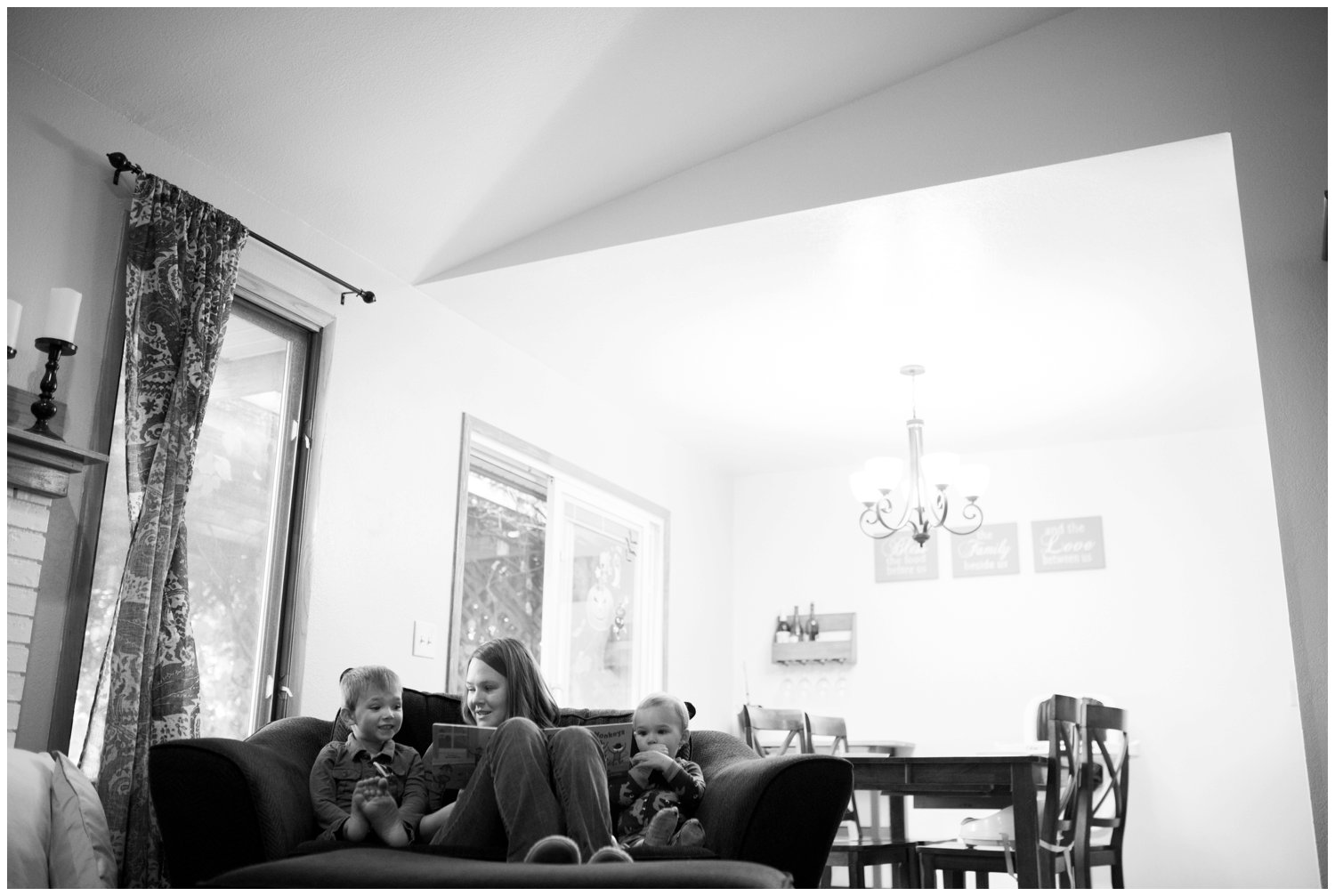 mother reads to sons in lifestyle family photography session