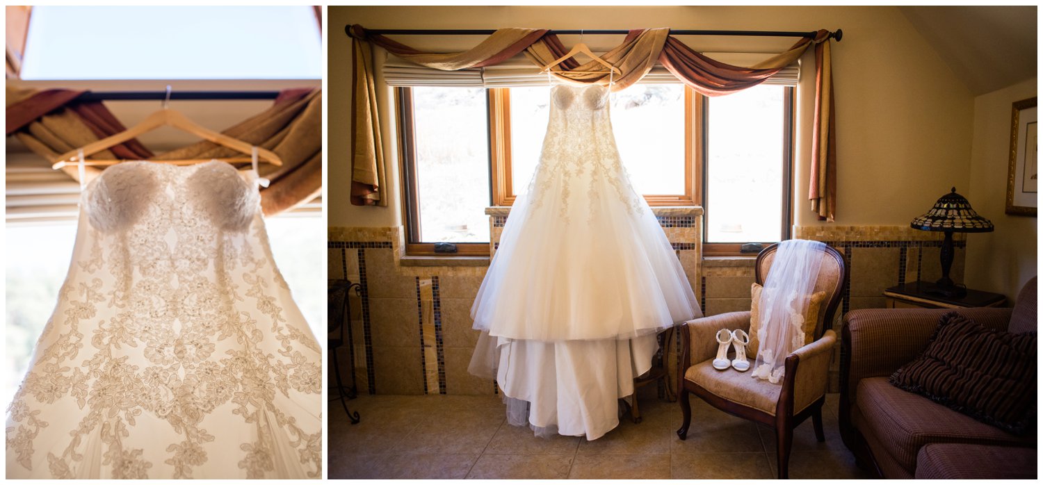 pretty wedding dress hanging in window