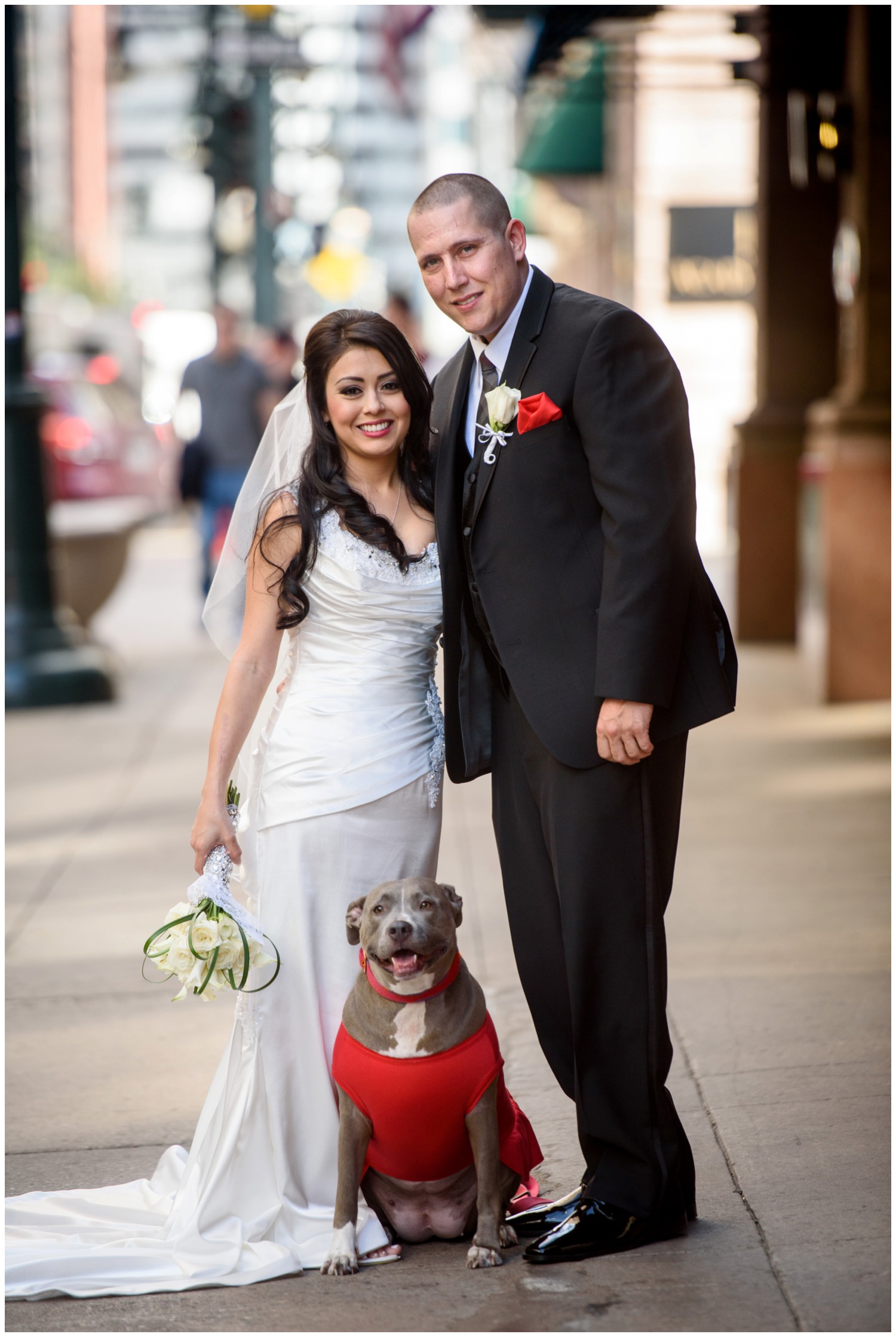 bride and groom with dog in downtown denver