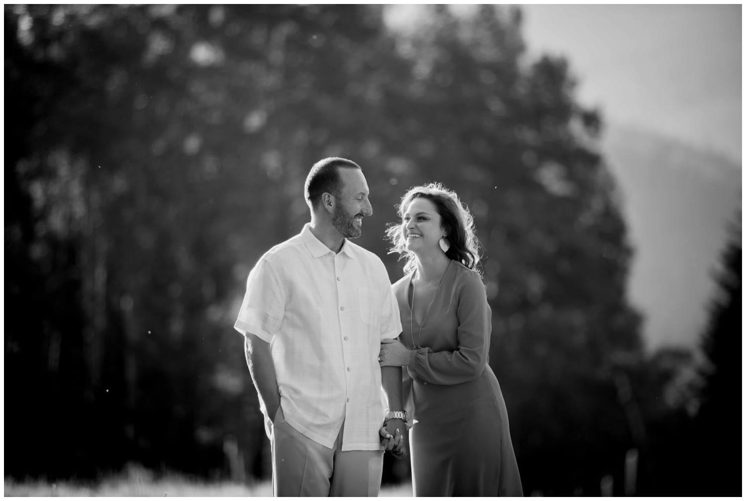 sunny black and white mountain photo of couple