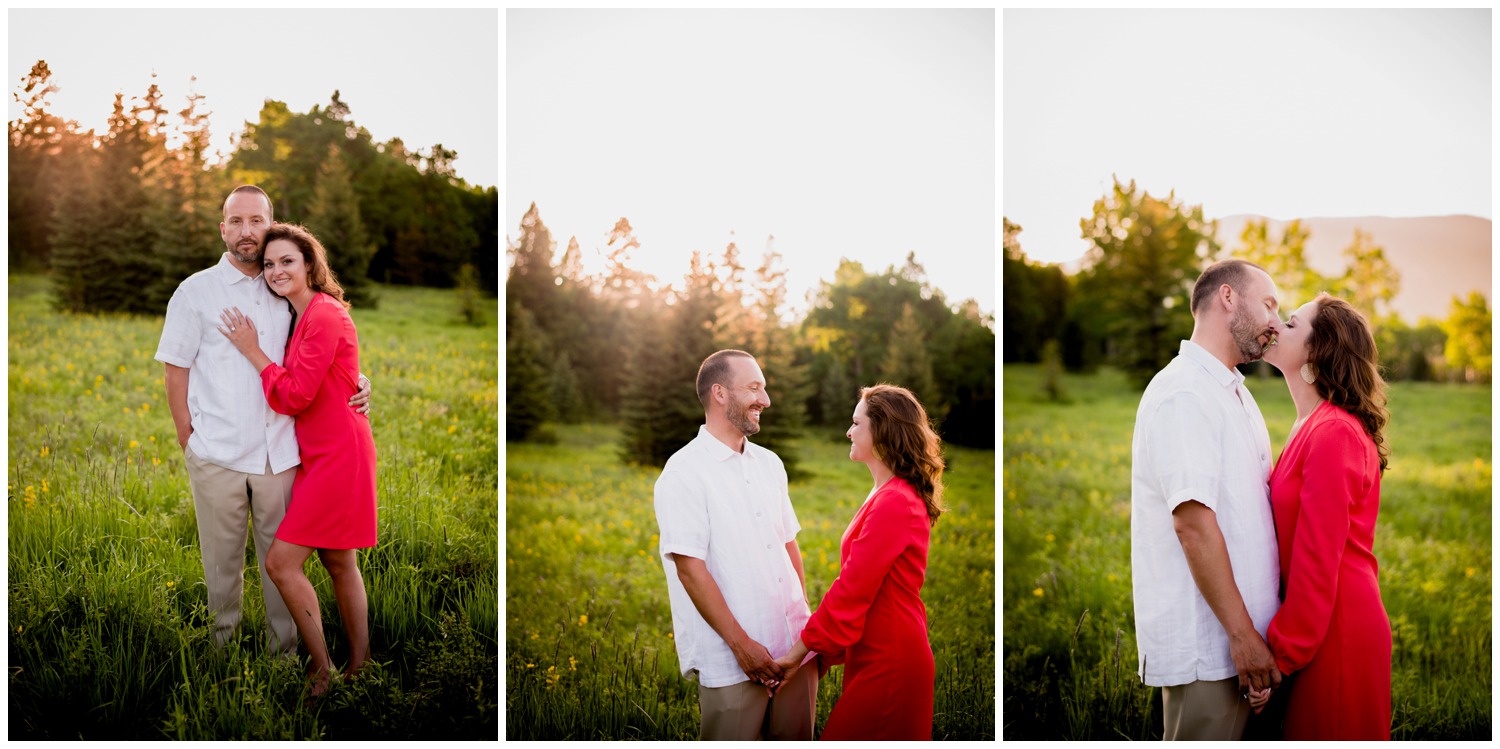 engaged couple laughs in colorado mountain meadow at sunset