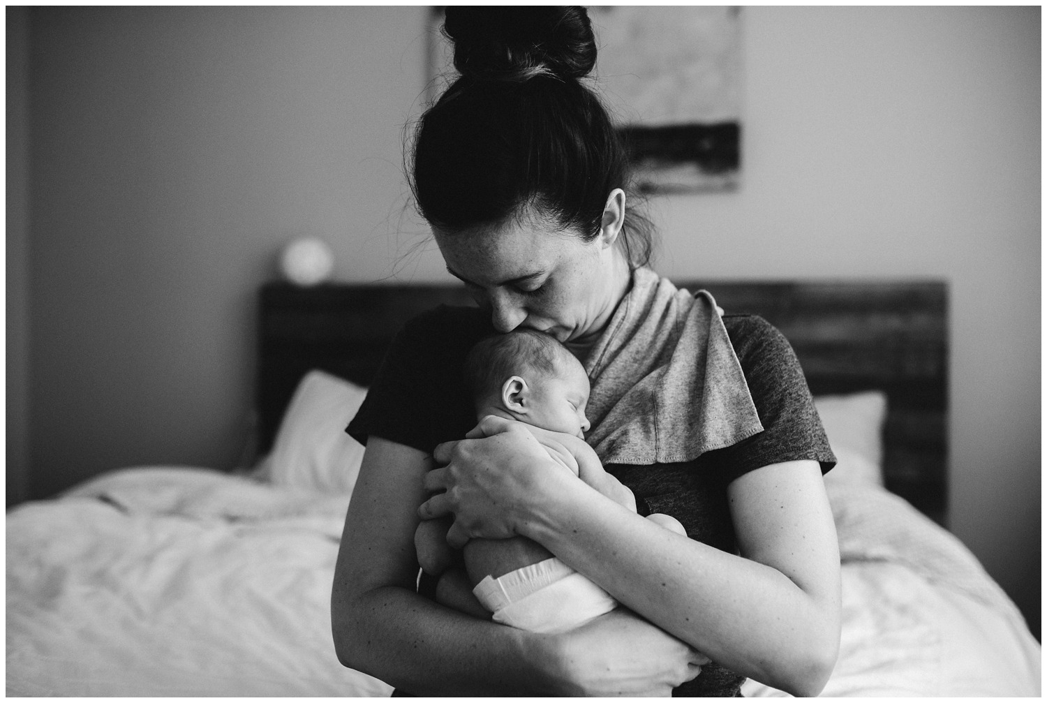 lifestyle newborn photo of mom and baby