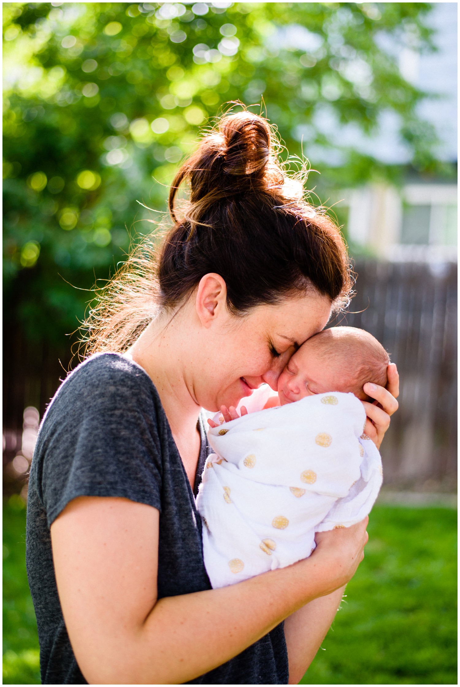 outdoor newborn photo in backyard