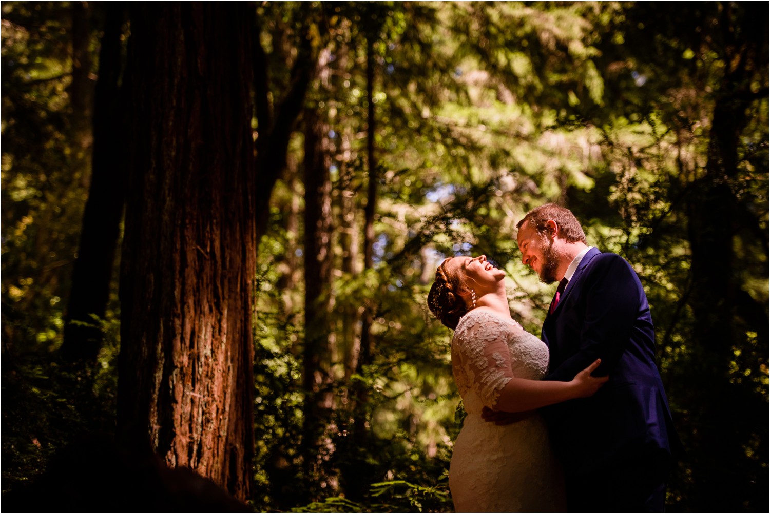 Bride laughs in sunny Redwood Forest photo