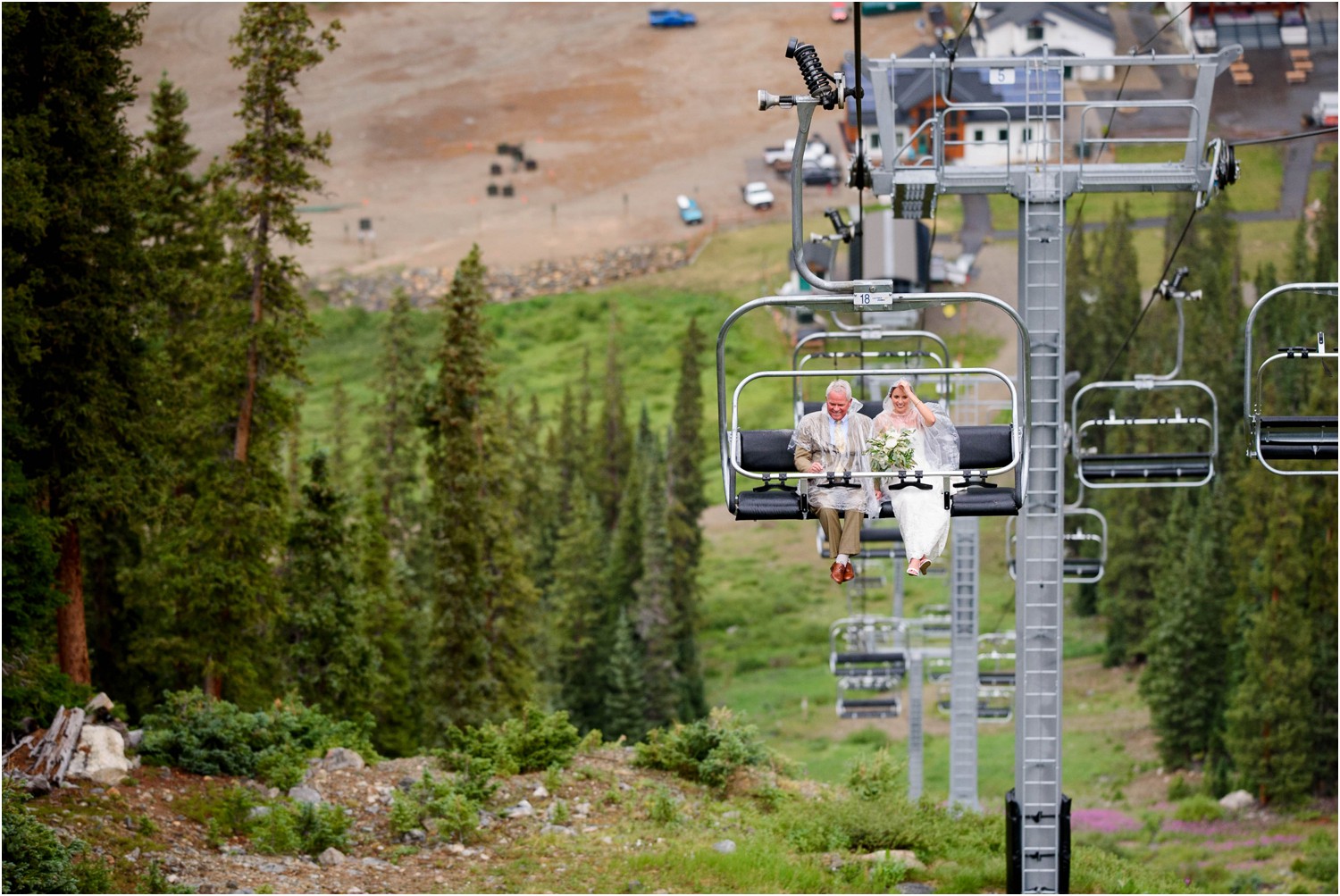 Bride rides chairlift at Colorado mountain wedding
